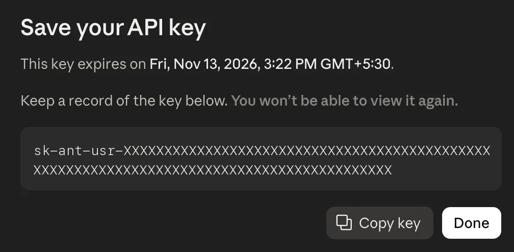 The Save your API key dialog showing the key's expiry date and time, the new key starting with sk-ant-usr- (replaced here by X characters), a Copy key button and a Done button