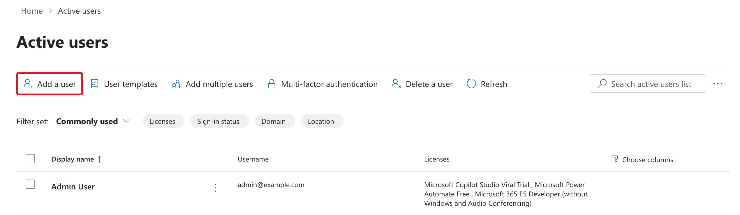 The Active users page in the Microsoft 365 admin center with the Add a user button outlined in red, next to User templates, Add multiple users and Multi-factor authentication, and one admin account in the list below