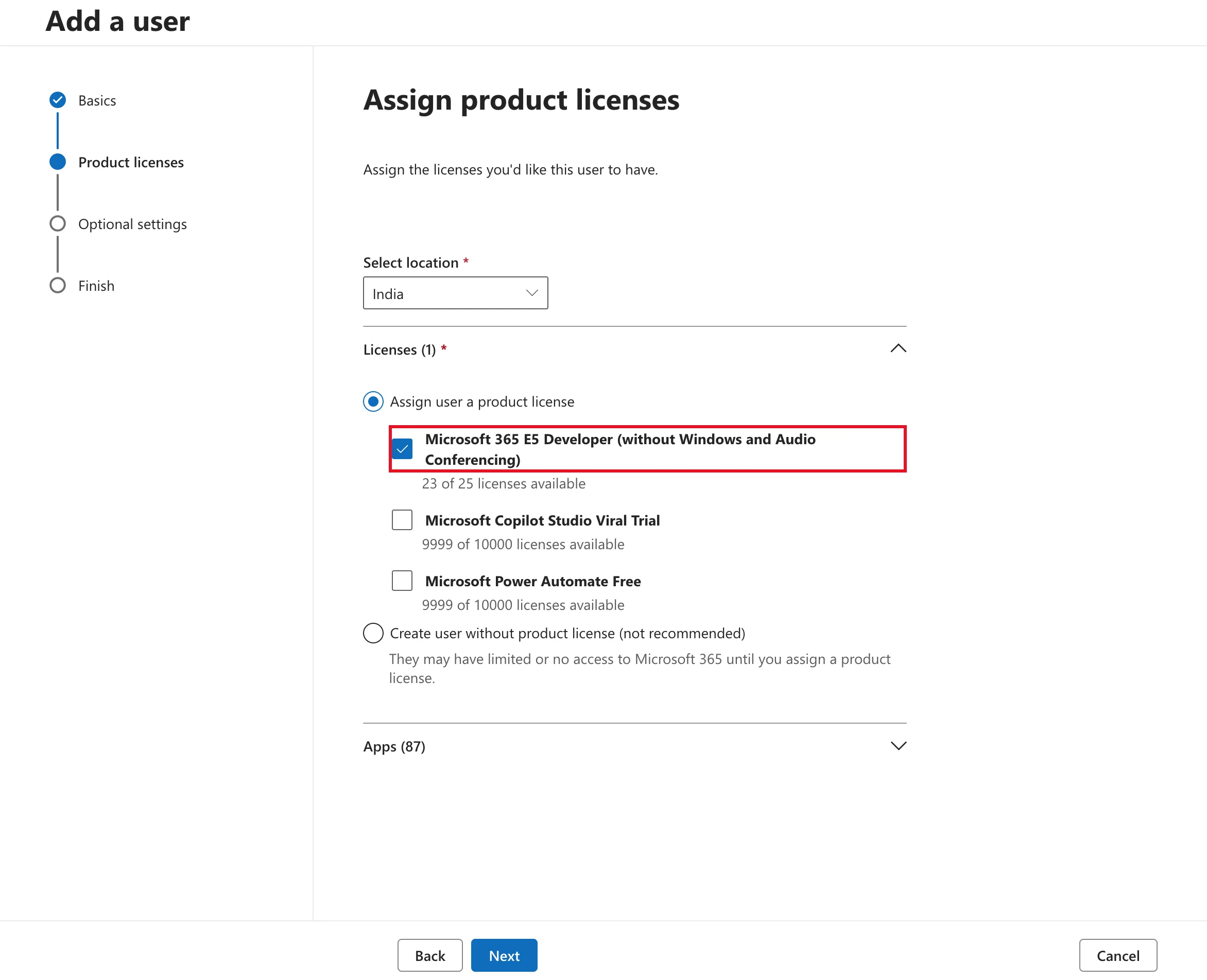The Assign product licenses page with Select location India, Assign user a product license selected, and Microsoft 365 E5 Developer (without Windows and Audio Conferencing) ticked and outlined in red, showing 23 of 25 licenses available