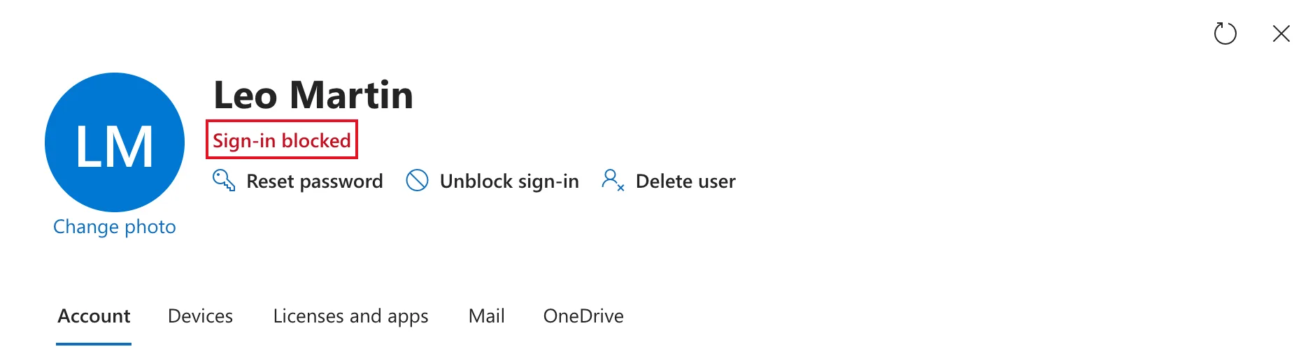 Leo Martin's details with Sign-in blocked outlined in red under his name, and Reset password, Unblock sign-in and Delete user