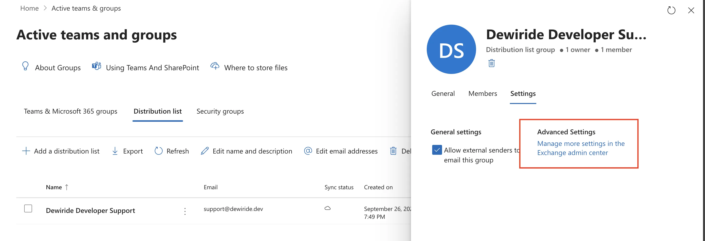 The new distribution list on the Distribution list tab of Active teams and groups, with its details pane open on the Settings tab showing Allow external senders to email this group ticked, and the Manage more settings in the Exchange admin center link outlined in red