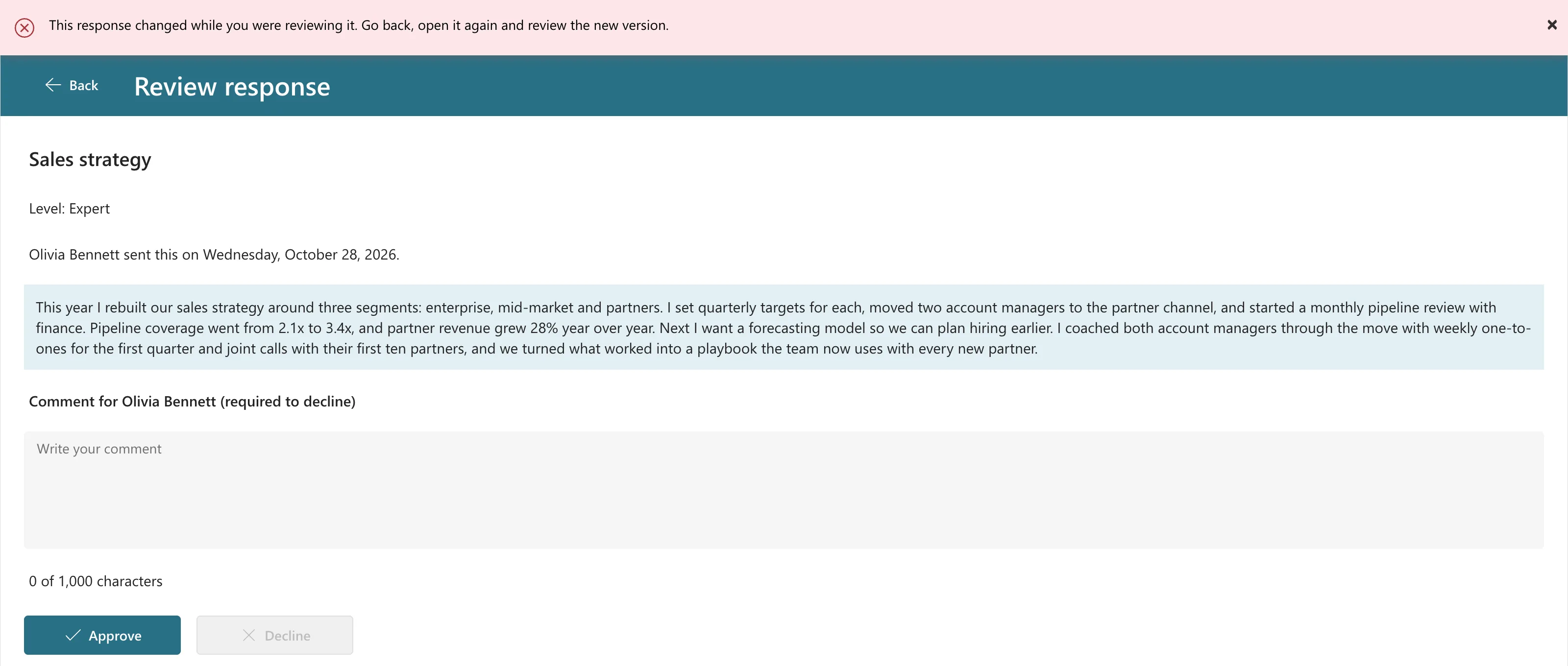 A red banner reading This response changed while you were reviewing it. Go back, open it again and review the new version., above the Review screen still showing the older text