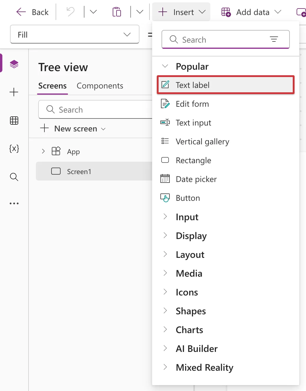 The Insert menu open below the Power Apps Studio command bar, with Text label outlined in red at the top of the Popular list, above Edit form, Text input and Vertical gallery