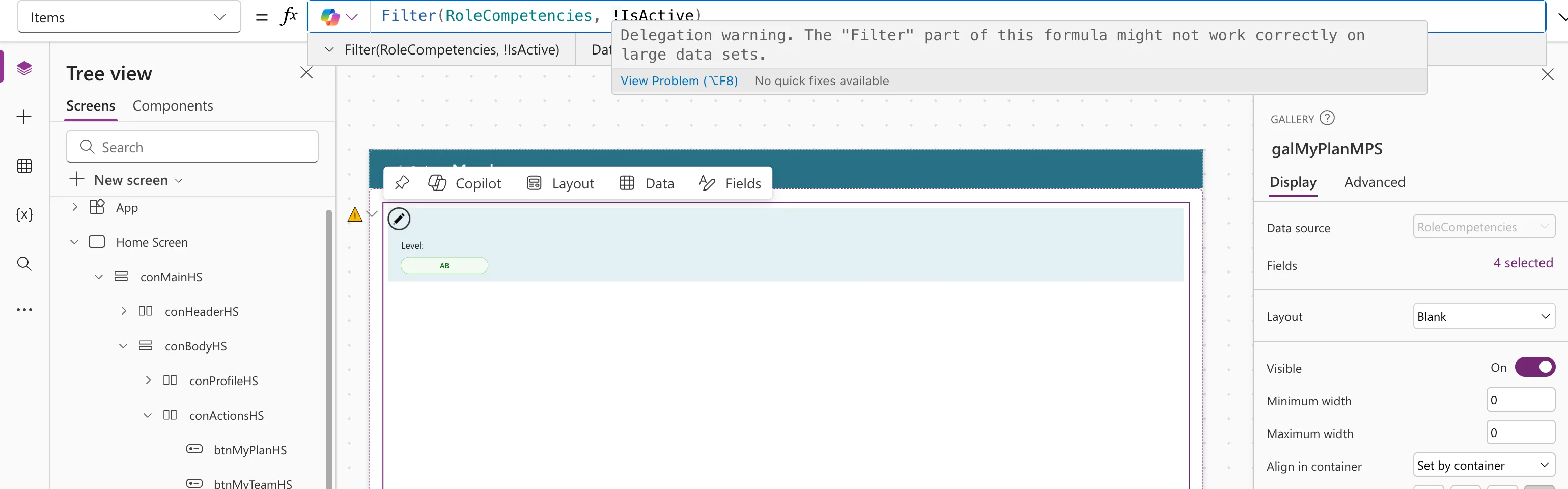 The formula bar with Filter(RoleCompetencies, !IsActive), a hover box reading Delegation warning. The Filter part of this formula might not work correctly on large data sets, and a yellow warning triangle next to the gallery on the canvas