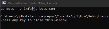 Console window showing the name and email values read from appsettings.json